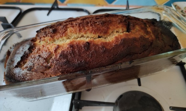 Homemade cake out of the oven with vanilla, banana and chocolate chips 