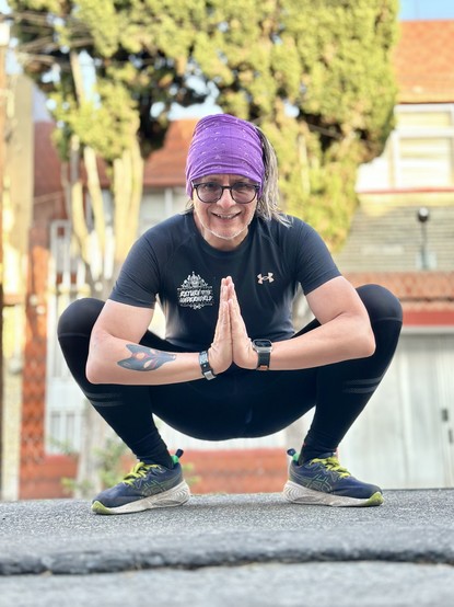 Me crouching in front of the camera after an early Sunday morning run 