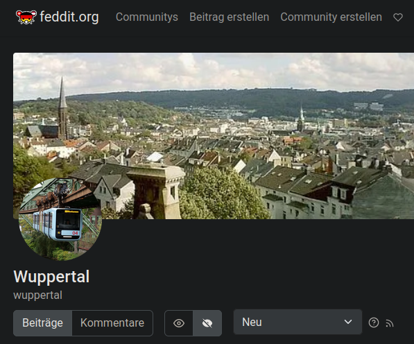 Startseite der Wuppertal-Community auf feddit.org - Bannerbild ist ein Stadtpanorama, Iconbild die Schwebebahn