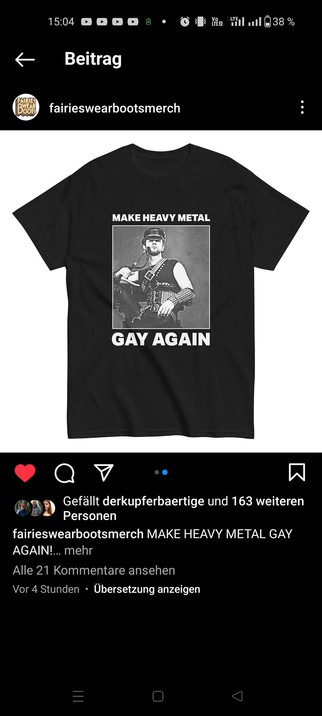a black shirt with a picture of Rob halford in leather outfit and the Slogan 