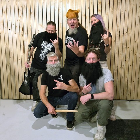 Death / thrash metal band Beyond the Pale wearing fake beards to celebrate World Beard Day