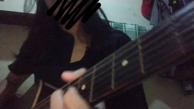 guy playing guitar