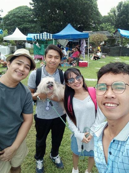 Groupie pic of me, my GF, her brother, and his BF. I'm holding our small dog.