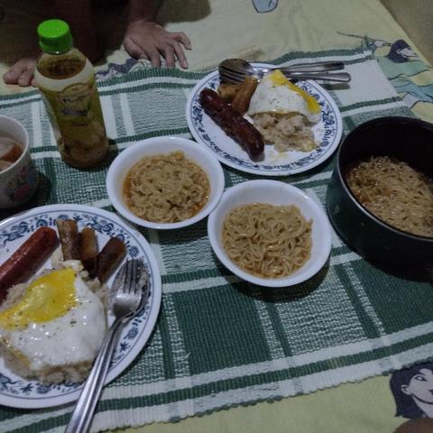 Week 1. Sausage, lumpia, egg, fried rice, instant noodles, bottled ice tea. Late night eats with partner.