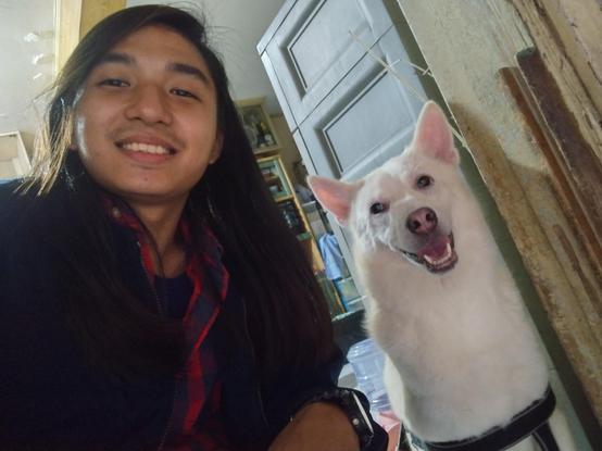 guy imitating smiling dog